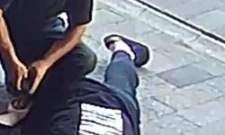 Yardım ediyormuş gibi yaptı, baygın gencin cüzdanını çaldı
